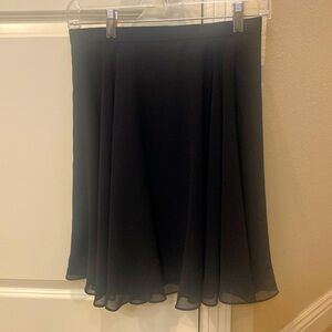 Short black flowy skirt